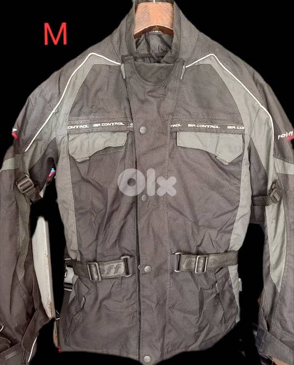 skii and snowboard , skiidoo vest and pants 1