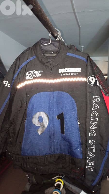 moto vest and pants 20$ 3