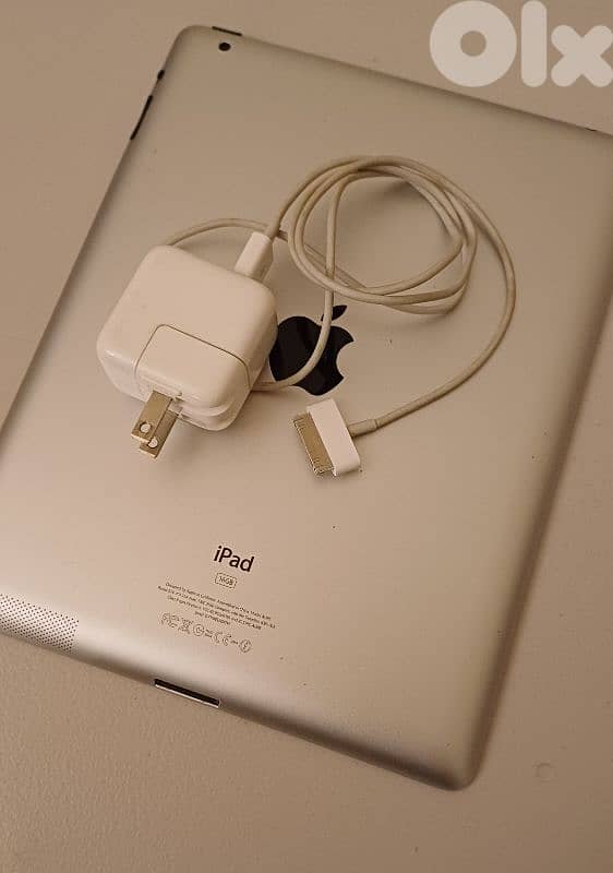 Ipad with original charger, 16 GB, working normally, Reset. 3