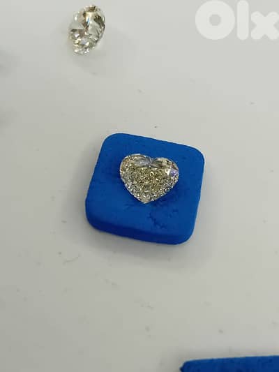 natural 3 ct. heart shape, light yellow si2