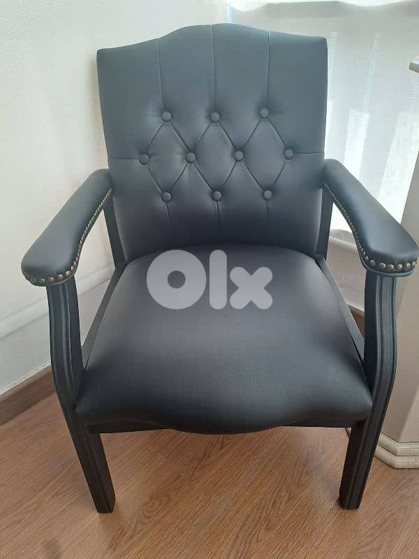 2 chairs , made of leather, excellent condition 1