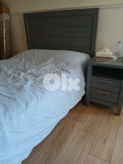 2 beds with a side table pottery barn