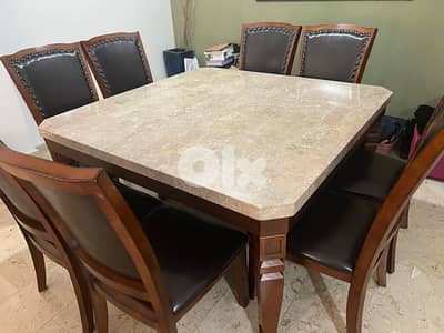 Marble dining table and 8 leather chairs