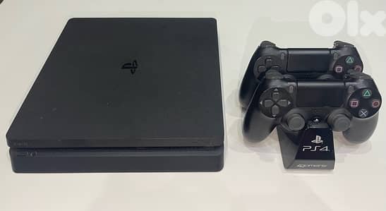 PS4 Slim + 2 Controllers + Controller Stand (Used, Good Condition)