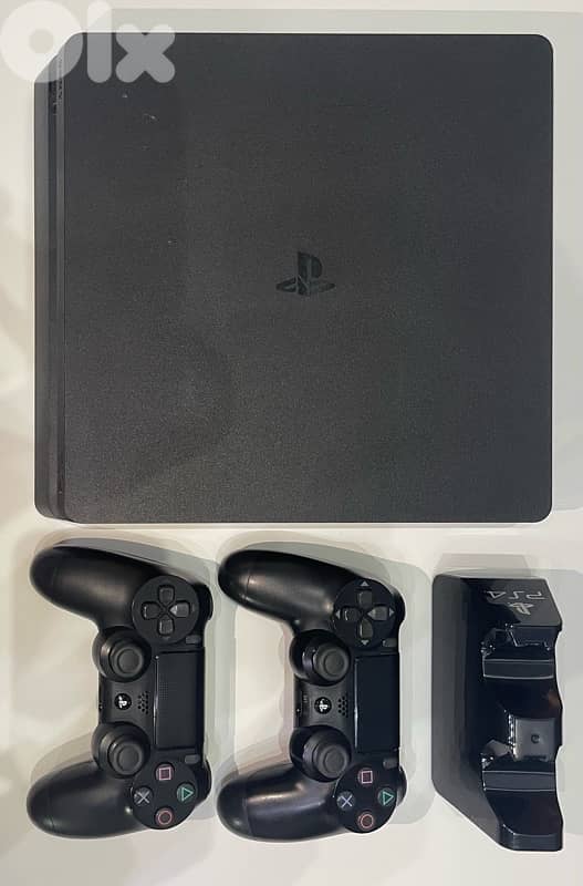 PS4 Slim + 2 Controllers + Controller Stand (Used, Good Condition) 1