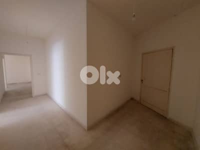 شقة سكنية في بناية سنتر مسعود على ساحة حلبا - عكار