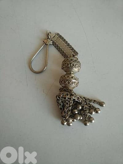 Old silver keychain - Not Negotiable