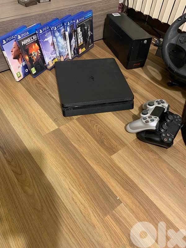 Premium PS4 Slim 1TB Bundle – Full Setup | Games, UPS & Steering Wheel 1