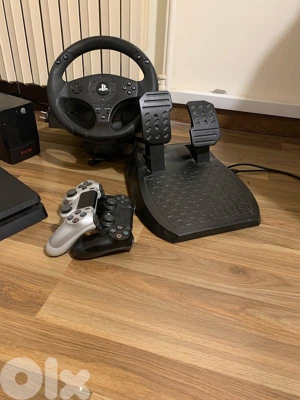 Premium PS4 Slim 1TB Bundle – Full Setup | Games, UPS & Steering Wheel 2