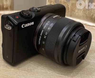 Canon eos m100 with lens 15-45m