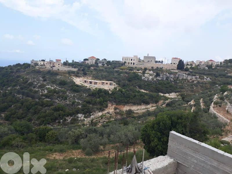 land for sale in chmout jbeil أرض للبيع في شموت جبيل 2