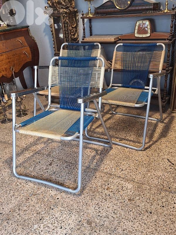 vintage foldable chrome chairs 1
