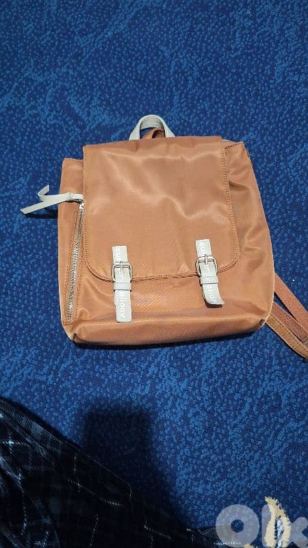 Small backpacks and handbags 8