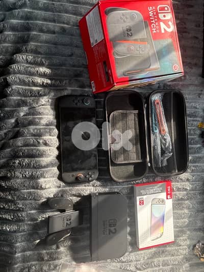 Nintendo switch 2 barely used (was a gift) perfect condition