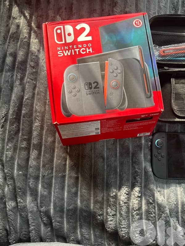 Nintendo switch 2 barely used (was a gift) perfect condition 1