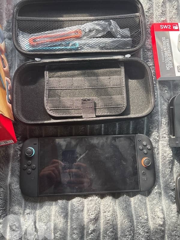 Nintendo switch 2 barely used (was a gift) perfect condition 2