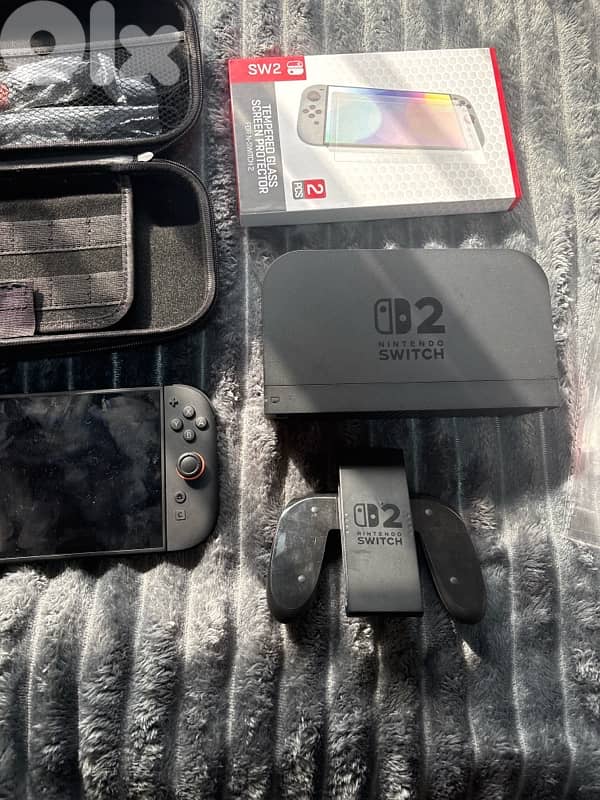 Nintendo switch 2 barely used (was a gift) perfect condition 3