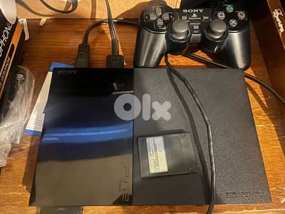 Original Sony PlayStation 2 / PS2 with original bag and 65 games CDs