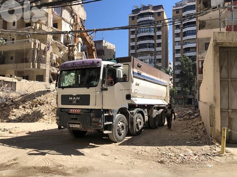 Camion عقرب قلاب مسجل نمرة بيضا 2