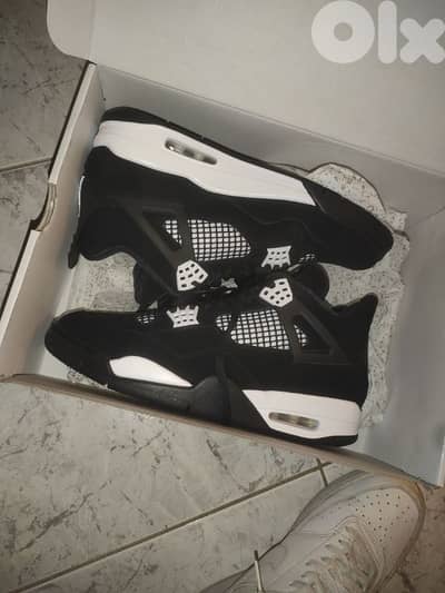 Air Jordan 4 Retro 'White Thunder'