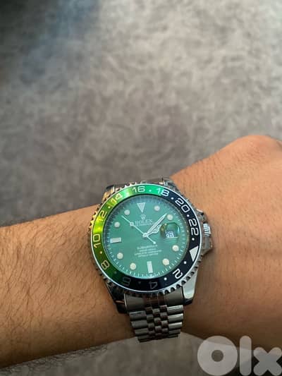 rolex oyster. perpetual date green dial premium copy swiss