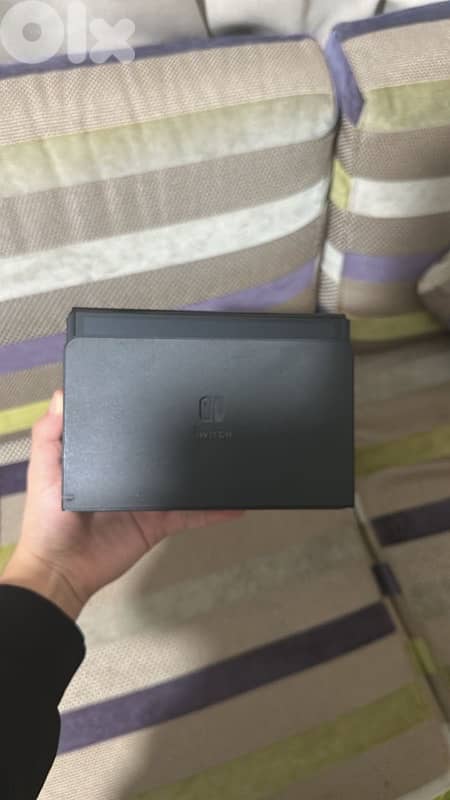 Nintendo switch OLED with 4 joycons and 1 pro controller 1