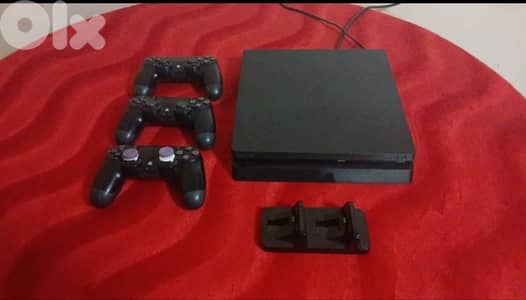 ps4 slim used 1 tb + 3 game with fc 26 installed and 1 year warranty