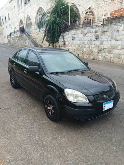 Kia Rio 2009 automatic 5ar2et lnadafi masdar cherki 163000 km