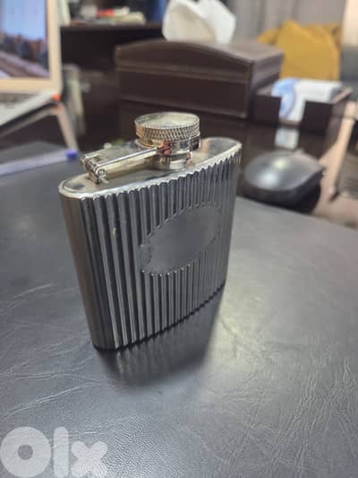 A metal bottle for spirits, alcohol drink