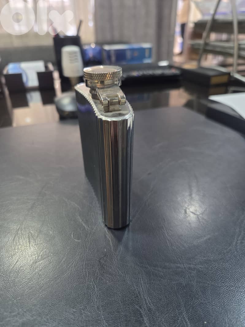 A metal bottle for spirits, alcohol drink 1