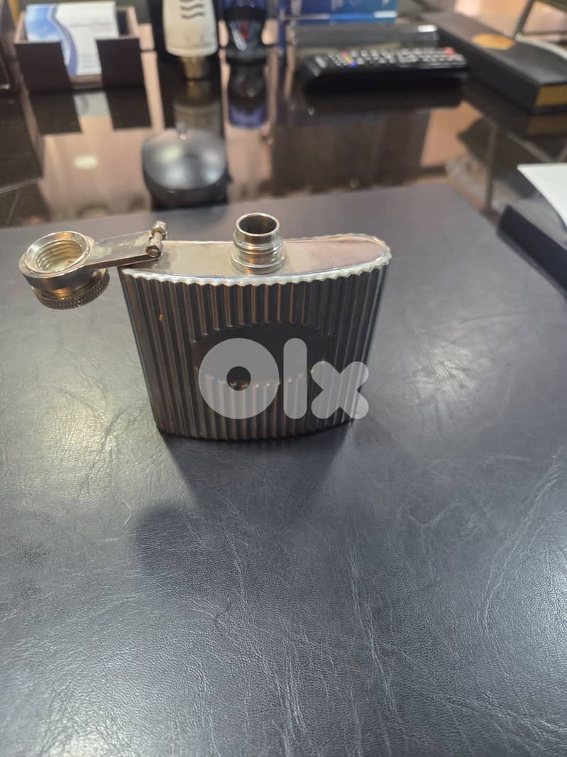 A metal bottle for spirits, alcohol drink 2