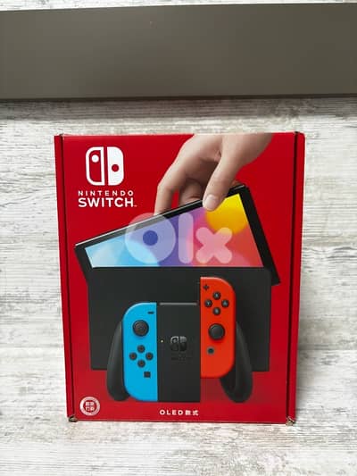 nintedo switch oled (NOT USED) open box fully clean