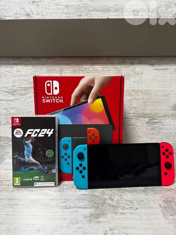 nintedo switch oled (NOT USED) open box fully clean 1