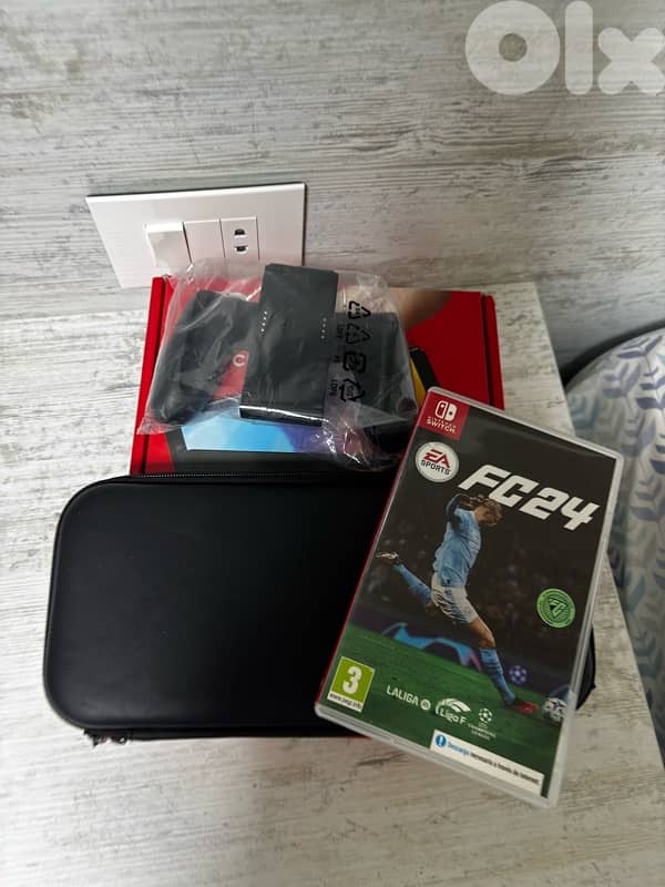 nintedo switch oled (NOT USED) open box fully clean 2