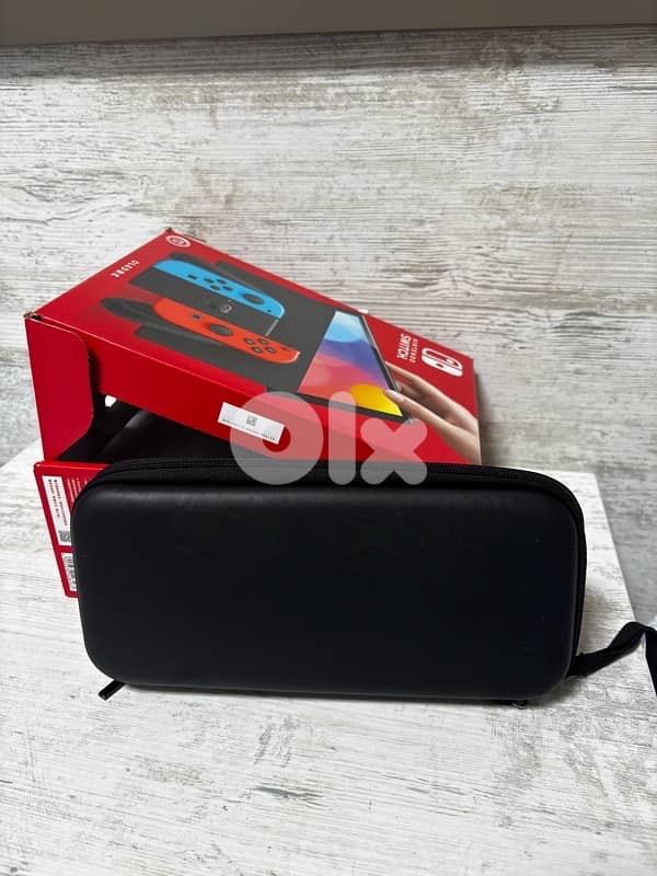 nintedo switch oled (NOT USED) open box fully clean 5