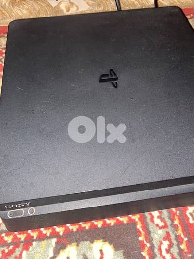 ps4 slim with controllers and cds