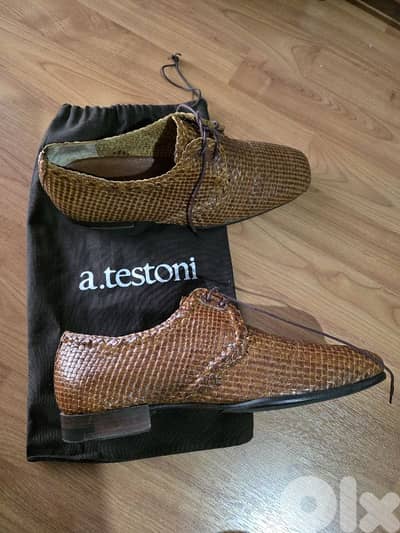 A. Testoni size 40