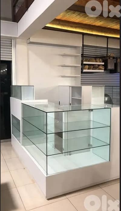 small glass and white wood shop