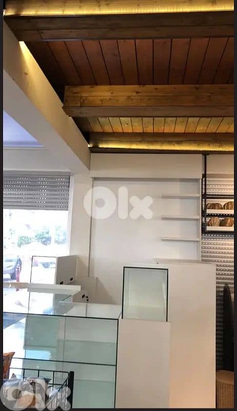 small glass and white wood shop 3