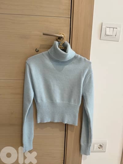 sweater baby blue color new in tag, one size