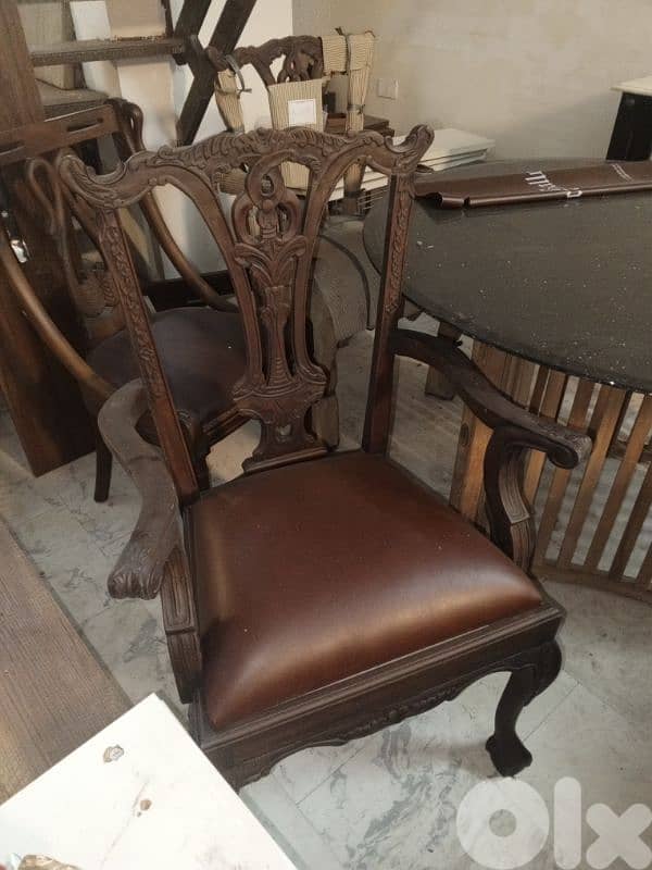 teak wood and leather armchairs 1