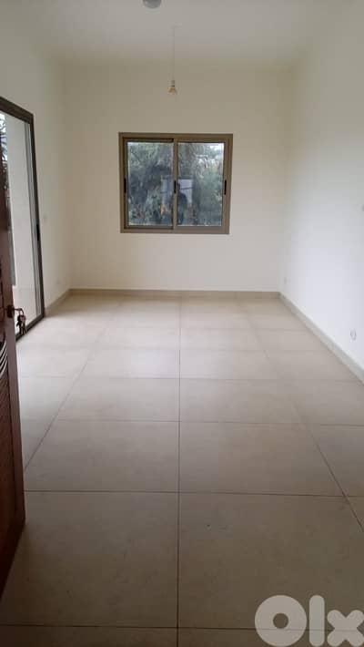 Apartment for sale in Amchit - شقة للبيع في عمشيت