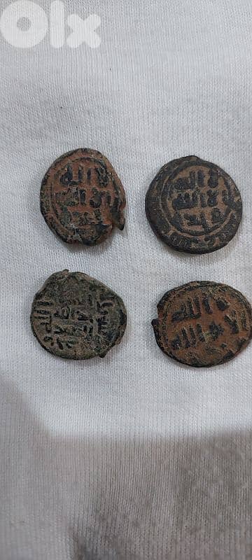 مجموعة من اربعة عملات قديمة فلوس برونز اموية و عباسية عمرها ١٣٠٠ عام