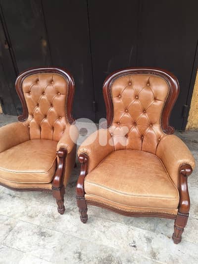 two pieces of chairs genuine leather original