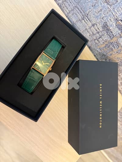 Daniel Wellington crocodile leather sunray rose gold watch  farfetch
