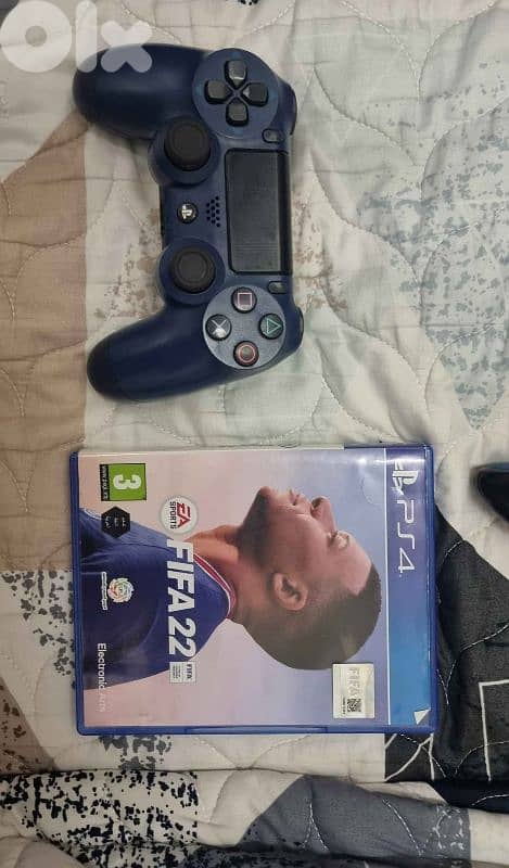 PS4 + 2 controllers + games 5