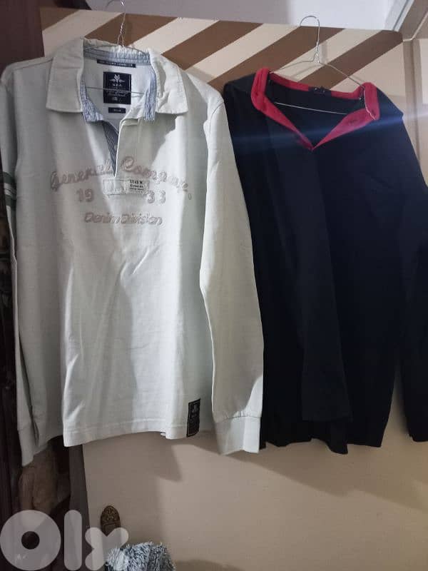 عندي ثياب مستعمله متل يلي بل صوور شروه كنزات وسوتشركم طويل وغير رجالي 12
