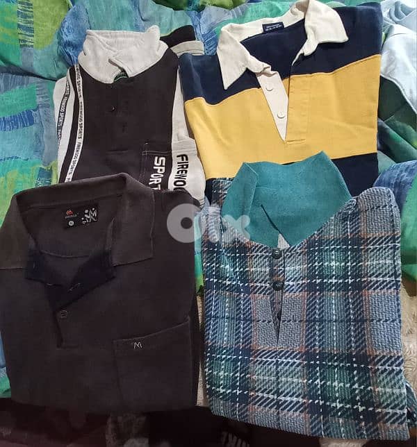 عندي ثياب مستعمله متل يلي بل صوور شروه كنزات وسوتشركم طويل وغير رجالي 15