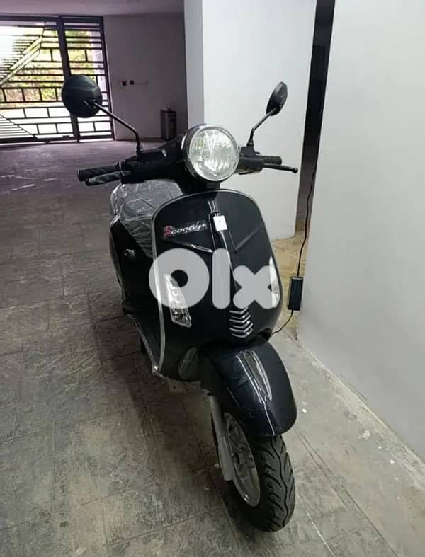 e-bike brand new vespa ( with warranty) 1