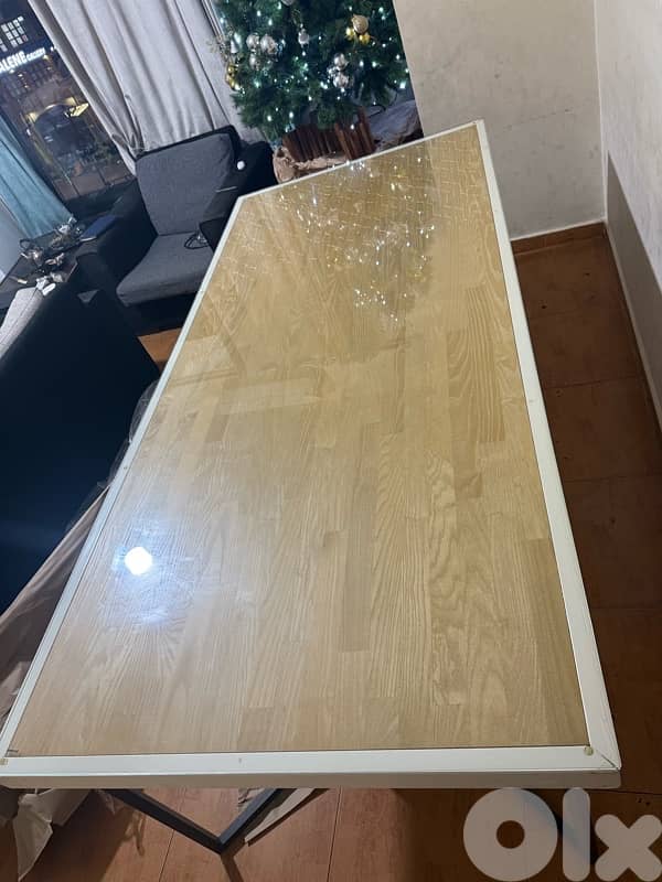 modern dining table with 6 matching chairs, in excellent condition. 2
